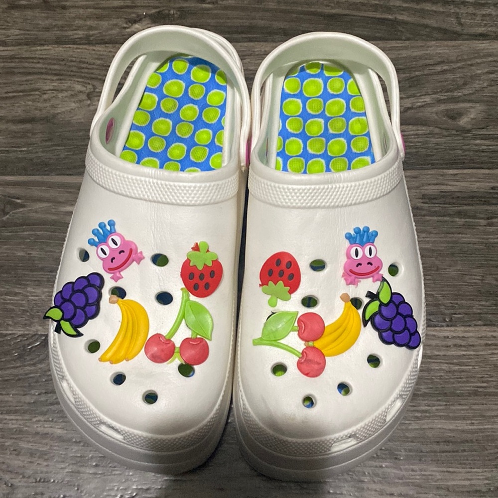 White “Crocs” with shoe charms